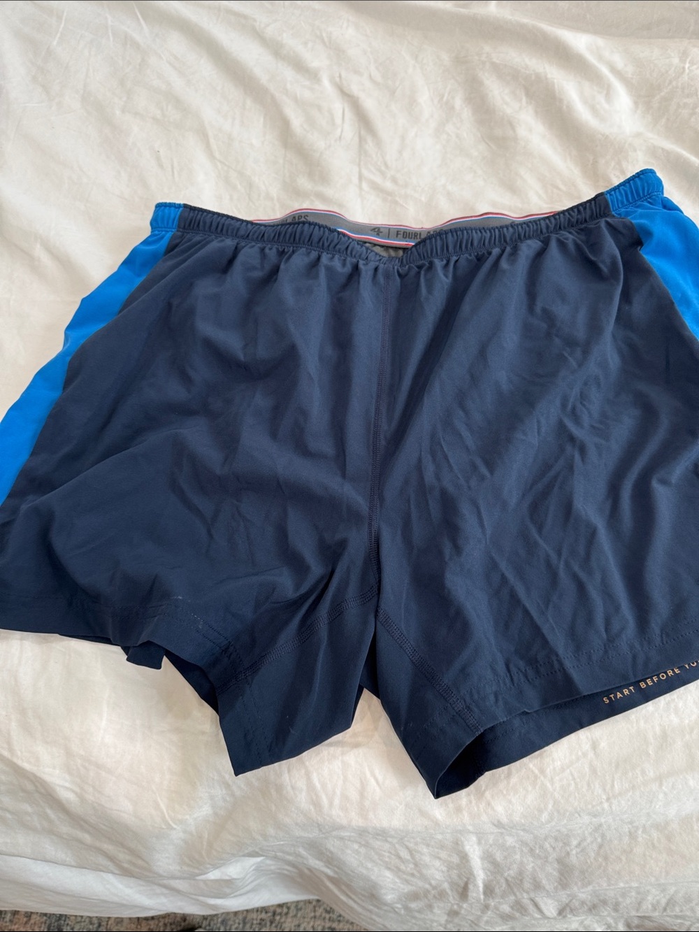 Fourlaps Men's Navy Blue Athletic Shorts with Bright Blue Side Panels